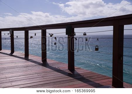 Love padlocks on handrail represent love and security