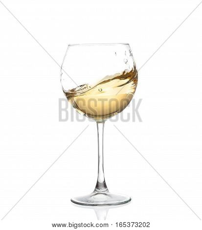 White Wine Swirling In A Goblet Wine Glass, Isolated On A White Background