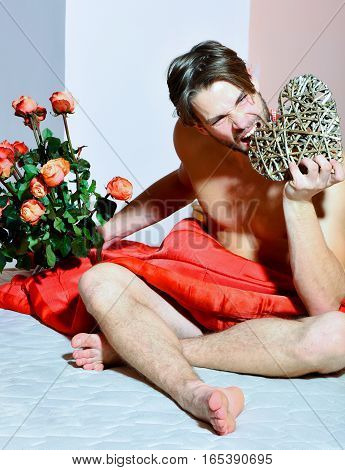 Bearded Macho Man With Roses