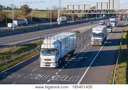 London, UK - November 2016: Traffic on the British M1 motorway and junction to motorway M25