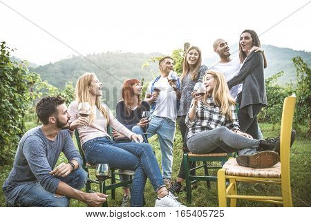 Group of friends at restaurant outdoors - People having dinner in a home garden