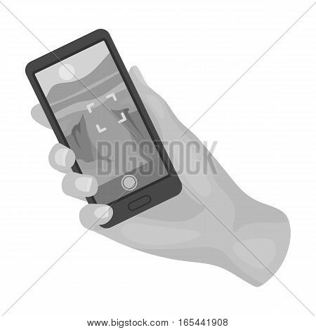 Taking photo on smart phone icon in monochrome design isolated on white background. Hipster style symbol stock vector illustration.