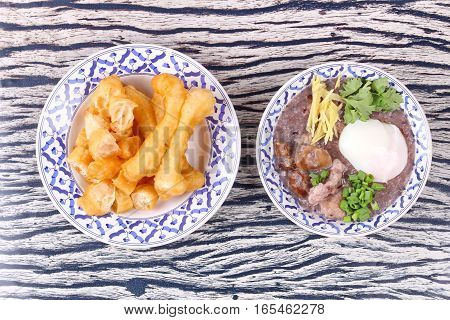 Red Brown Rice , Porridge With Mined Pork And Chicken Lever .