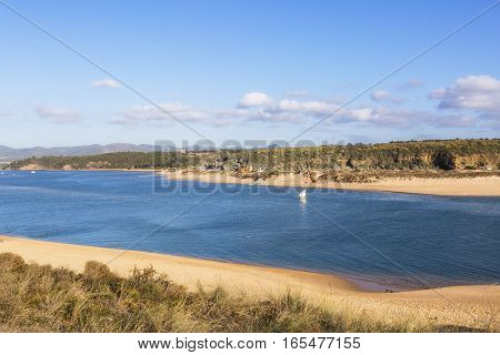 The river flows into the Atlantic Ocean in the west of Portugal. Vila Nova de Milfontes, Portugal.