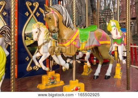 carousel ride with horses in the park