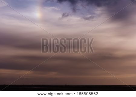 Cloudy Sky With Sundog