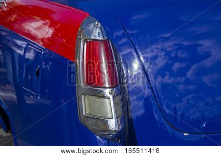 MOSCOW RUSSIA - OCTOBER 1 2016: Stoplight of the old egendary Soviet car Volga GAZ M-21. The car is painted as a road police car.