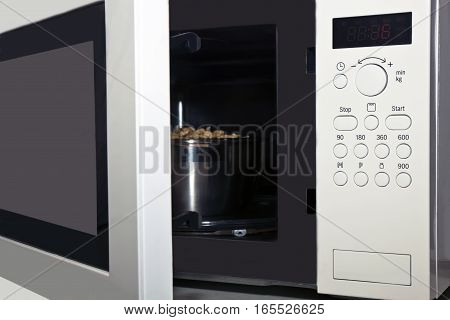 a microwave oven with an open door