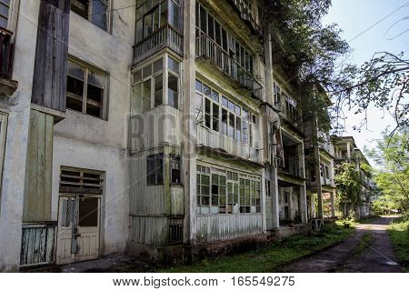 Abandoned mining ghost-town Polyana, Abkhazia. Destroyed empty houses, remnant of The Georgian-Abkhazian war