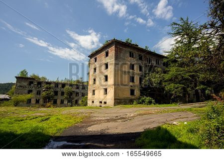 Abandoned mining ghost-town Polyana, Abkhazia. Destroyed empty houses, remnant of The Georgian-Abkhazian war