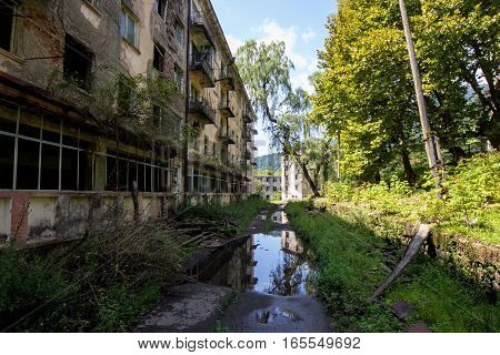Abandoned mining ghost-town Polyana, Abkhazia. Destroyed empty houses, remnant of The Georgian-Abkhazian war