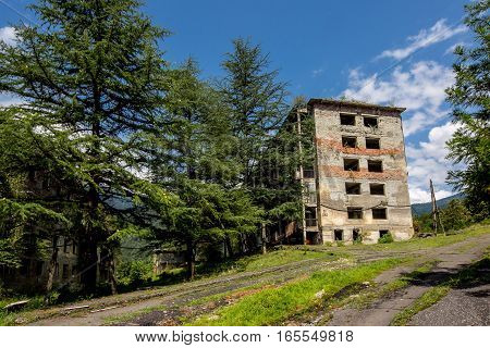 Abandoned mining ghost-town Polyana, Abkhazia. Destroyed empty houses, remnant of The Georgian-Abkhazian war