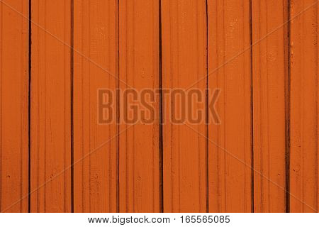 Texture of old wooden planks with peeling color paint