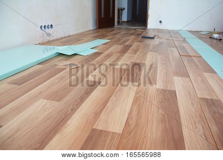 Laminate flooring interior. Installing wooden laminate flooring.