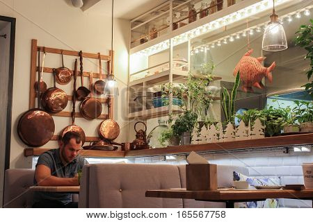 St. Petersburg, Russia - 17 December, Items ancient utensils in a restaurant interior, 17 December, 2016.
The interior of the restaurant on the Petrograd side.
