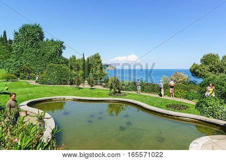PARTENIT CRIMEA RUSSIA - JUNE 10.2016: The pond on the shore of the Black sea in the Park of Paradise. Partenit Crimea Russia