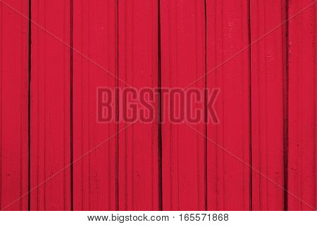 Texture of old wooden planks with peeling color paint