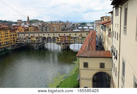 Ancient Bridge Called Ponte Vecchio And Vasari Corridor In Flore