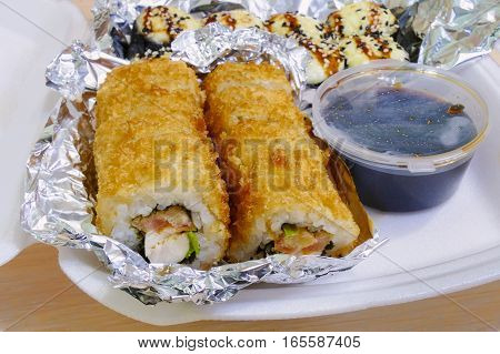 Tempura Maki Sushi - Deep Fried Roll with ckicken wrapped in foil to keep hot for delivery.