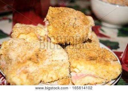 Potatoes gateau stuffed with ham and cheese