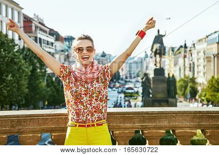 Tourist Woman On Wenceslas Square In Prague Rejoicing
