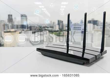 Black three poles wifi router on the white table with wifi and computer icon