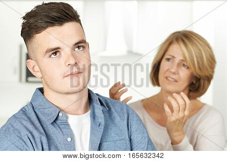 Mother Arguing With Teenage Son At Home