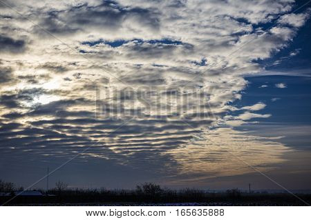 vertical stratus cloud formation , Romania .