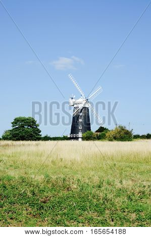 BURNHAM OVERY STAITHE, UK - AUGUST 30, 2016: The tower Windmill, built in 1816 was used as a corn ill until damaged by a storm, Norfolk, UK