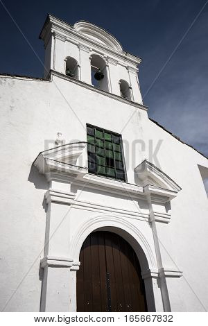 small white church facade in Popayan Colombia