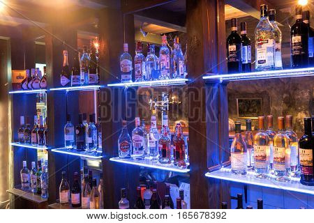 Moscow Russia - December 12 2016: Bottles of alcohol behind the bar