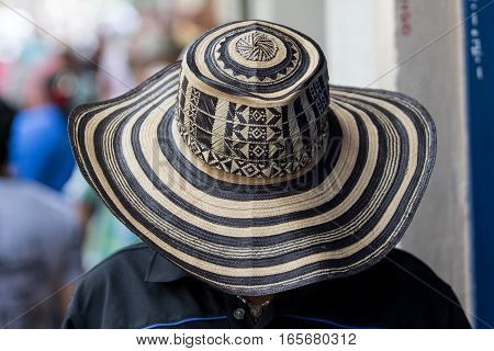 September 30, 2016 El Jardin, Colombia: man wearing a traditional Colombian straw hat called sombrero vueltiao