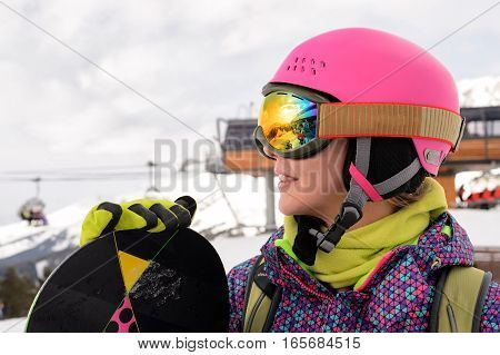 Portret of Snowboarder girl at Arhiz, Caucasian mountain.