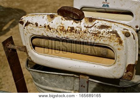 Two old wringers and a tub for washing rags and towels at an old gas stations