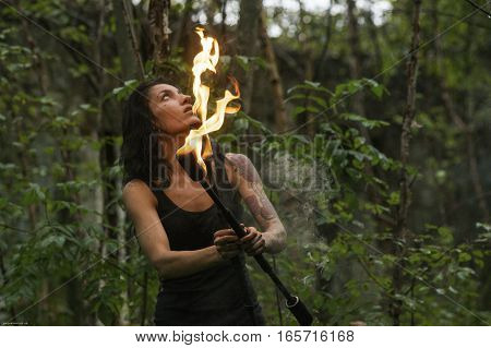 fire show Fire Breather Large Plume Of Flame the girl