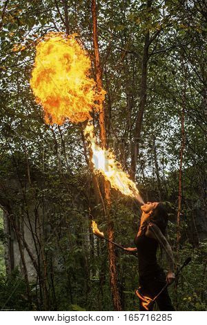 fire show Fire Breather Large Plume Of Flame the girl