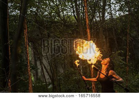 fire show Fire Breather Large Plume Of Flame the girl