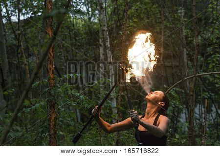 fire show Fire Breather Large Plume Of Flame the girl