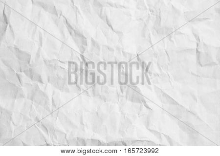 Gray crumpled paper floor texture background. Top view of brown pastel book cover above. White sepia dirty surface light and board grain. Scene painted pattern vintage style.