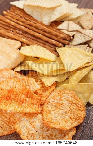 Heap Of Salted Crisps, Breadsticks And Cookies, Concept Of Unhealthy Food