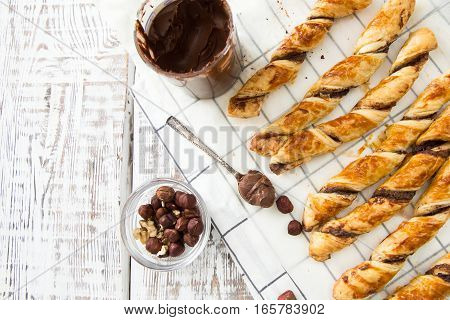 Homemade Cakes - Puff Pastry With Chocolate Paste. Twisted Cakes With Chocolate