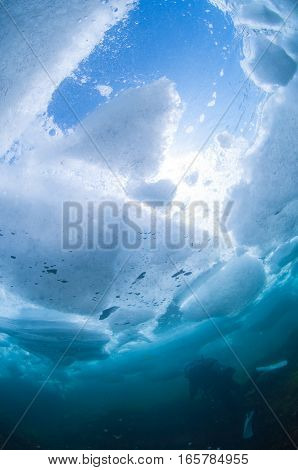 Drift Ice Diving in Shiretoko Utoro , Hokkaido , Japan.