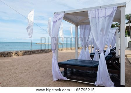 Simple beach pavilion on the beach sea view
