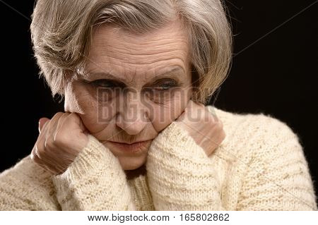Portrait of a upset mature woman, close up