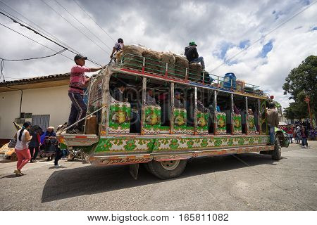 September 6, 2016 Silvia Colombia: the colourful windowless old chiva buses are used to transport people as well as merchandise to the local market