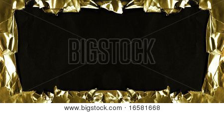Papírové zlato a černým pozadím