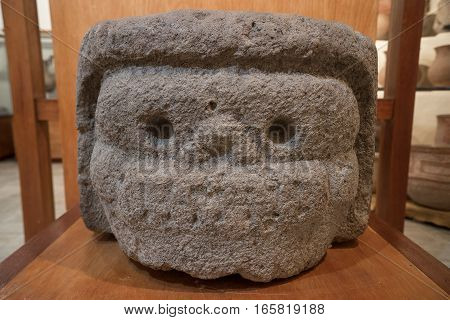 pre-columbian carved head statue in Tierradentro Colombia