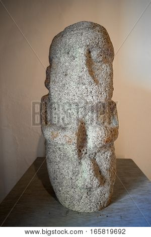 pre-columbian stone statue of a male in Tierradentro Colombia