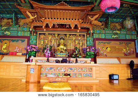 January 12, 2017 in Tehachapi, CA:  Inside a Buddhist temple building which has colorful Zen spiritual decorations including a Buddha Statue taken at Tae Go Sah Buddhist Monastery where people can meditate daily and attend Sunday services in Tehachapi, CA
