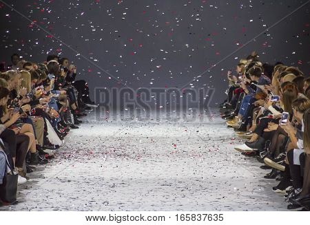 KYIV, UKRAINE - OCTOBER 13, 2016: Audience watching the show during the 39th Ukrainian Fashion Week at Mystetsky Arsenal in Kyiv